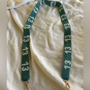 13 beaded purse strap.